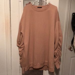 Long Sweater Dress with ruffled sleeves.